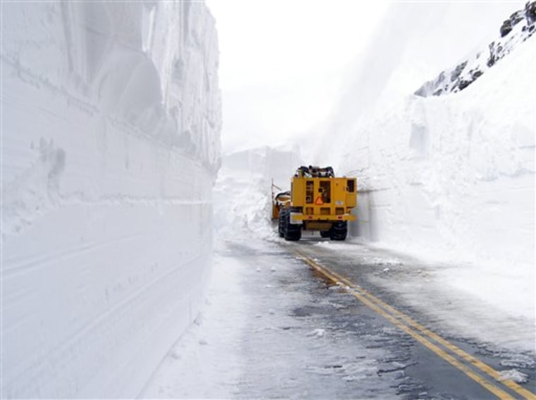 A snowplow faces 23 feet of snow on Trail Ridge Road in Rocky Mountain National Park in Colorado on May 13. 